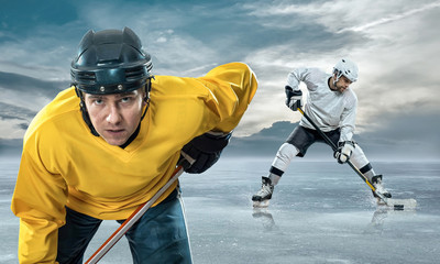 Ice hockey player on the ice in mountains