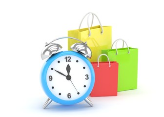 alarm clock and shopping bag (time to buy concept)