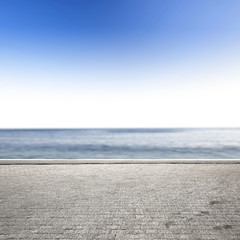 Fototapeta na wymiar gray pier and sea 