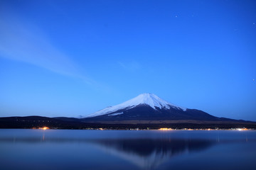 Mount Fuji and Lake Yamanaka at night.