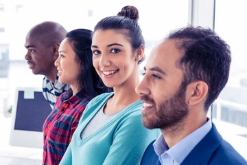 Obraz premium Portrait of businesswoman with colleagues