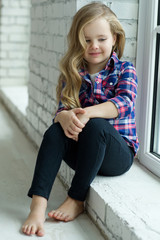 Happy little girl near wall  © nuzza11
