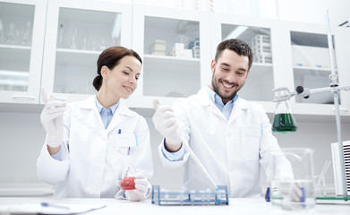 young scientists making test or research in lab