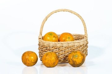 tangerines in a beautiful basket