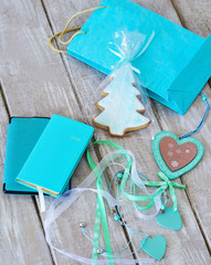 Turquoise decorations on the wooden board top view