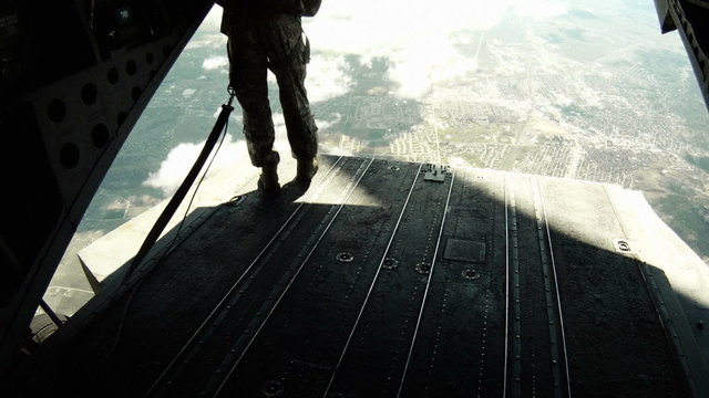 Walking from the front to the back of a CH-47 Chinook Helicopter.
