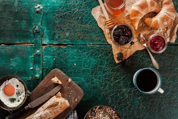 Breakfast spread with coffee, bread and preserves