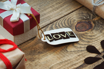 Gift boxes and label with word Love