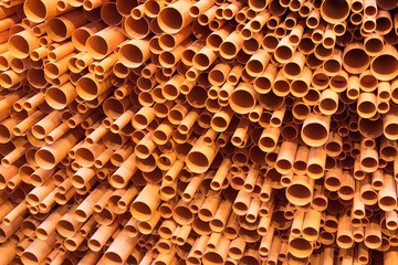 PVC pipes stacked in construction site