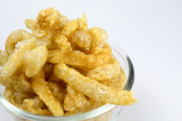 Pork Crackling, Pork Rind, Pork Scratchings or Pork Snack in bow