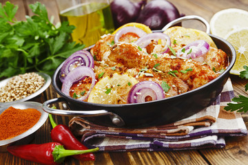 Spicy chicken in a ceramic pot