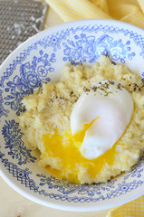 Millet Porridge with Poached Egg and Grated Cheese
