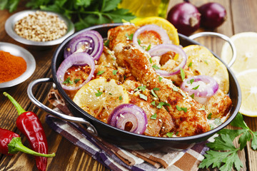 Spicy chicken in a ceramic pot