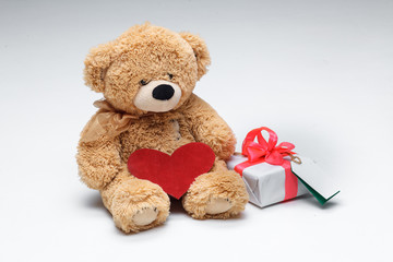 Teddy Bears couple with red heart. Valentines Day concept.