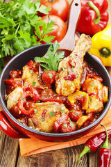 Chicken in a sauce of tomato and pepper