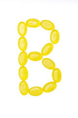 B letter made of colors candy