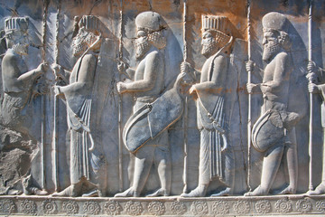 Soldiers of historical empire in ancient city Persepolis, Iran. UNESCO World Heritage Site