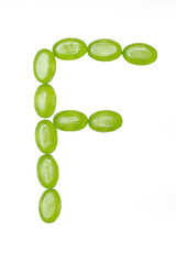 F letter made of colors candy