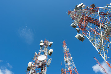 Three big radio mast with blue sky - obrazy, fototapety, plakaty