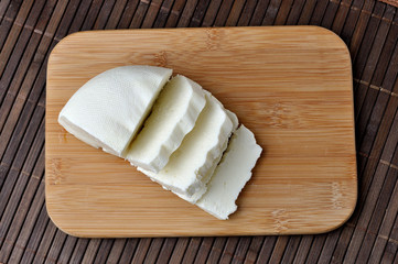 goat cheese on wooden platter