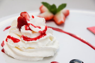 Whipping Cream with strawberry sauce