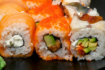 Various sushi on the plate close up