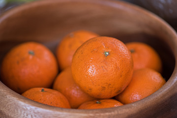 tangerines on wooden background