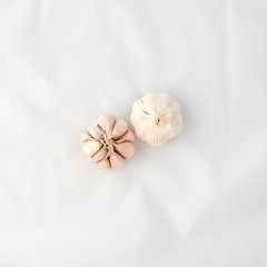 Fototapeta na wymiar Two head of garlic in top perspective