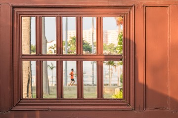 Running at The Park (Looking through a window) 