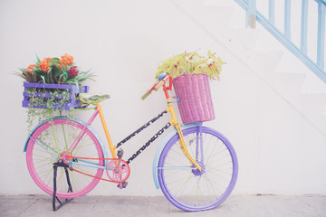 Fototapeta na wymiar Retro decorative bicycle with flowers pots