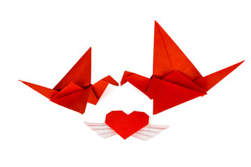 Origami birds from old vintage paper. Birds love. Birds kiss. Love birds.