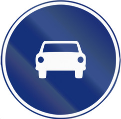 Obraz premium Road sign used in Spain - Mandatory car lane