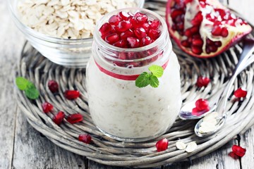 Overnight oats with pomegranate. Healthy eating. Selective focus.