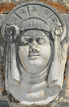 Old sculpture of a Chubby Face
