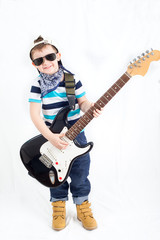 A young boy with electric guitar, isolated on white background
