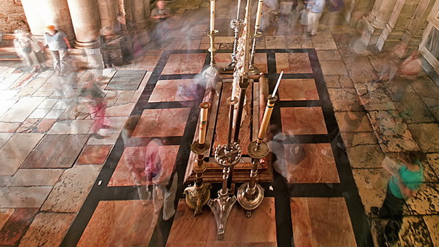 Time lapse of crowds praying at Stone of Anointing. Cropped.