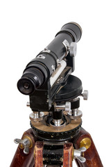 vintage theodolite over white background