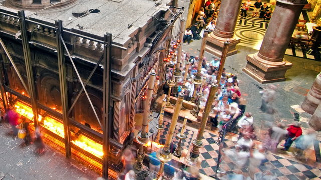 Panning shot of Time lapse of crowds visiting the Church of the Holy Sepulchre