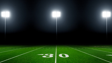Plakat Football field illuminated by stadium lights