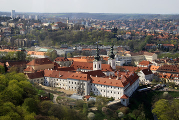 Fototapeta na wymiar PRAGUE, CZECH REPUBLIC - APRIL 24, 2013: The aerial view of Strahov Monastery from Petrin Hill. Prague, Czech Republic