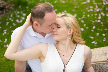 Fototapeta premium Lovely couple embraces outdoors