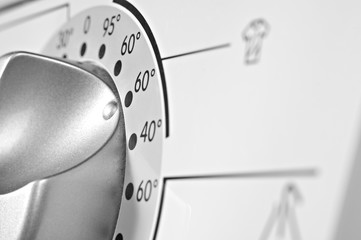 Washing machine controls Temperature control on washing machine Close up of a washing machine...