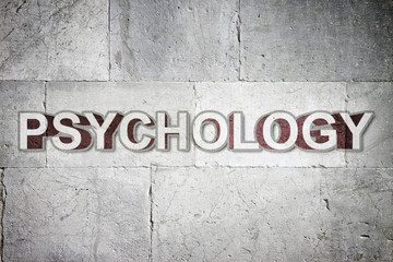 Psychology written on a stone wall - concept image