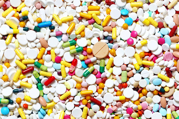 A lot of colorful medication and pills from above - 100073928