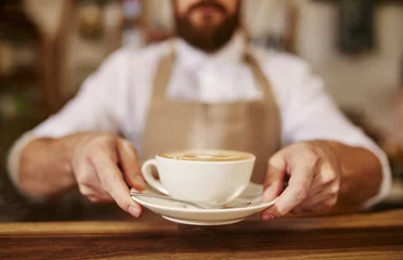 Türaufkleber Barista serviert eine Tasse frischen Kaffee für Sie © Jacob Lund