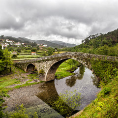 Fototapeta na wymiar Romanesque bridge, Alvoco das Varzeas, Portugal
