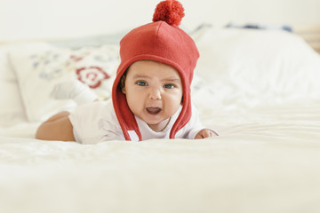 Cute Baby Girl Crying in the Crib.