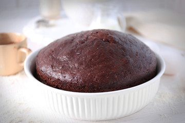Cooked chocolate pie in a baking tray on a table