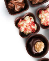 Assorted chocolate candies, isolated on white