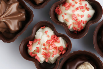 Assorted chocolate candies, close up